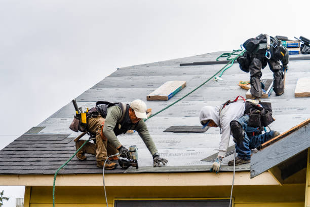 Professional Gutter Installation technician working in Spring City, PA